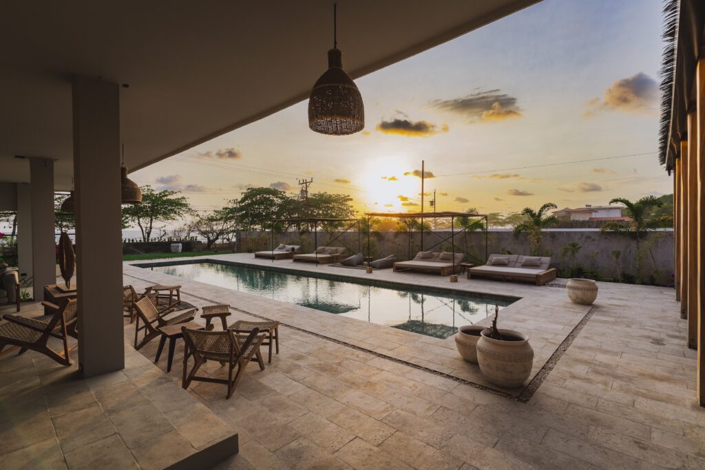 Swimming pool with sunset view in beachfront villa near Jaco Costa Rica