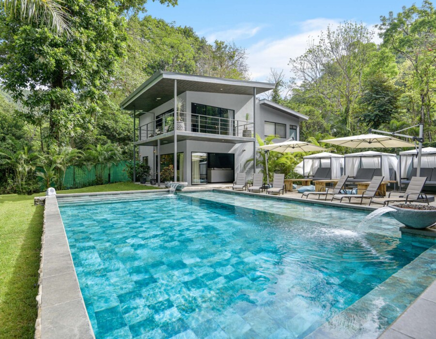 Beautiful private tents for lounging with white fabrics by the pool at Seven Ranch