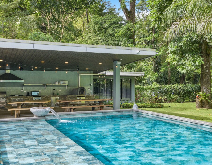 Turquoise pool overlooking the outdoor ranch at Seven Ranch
