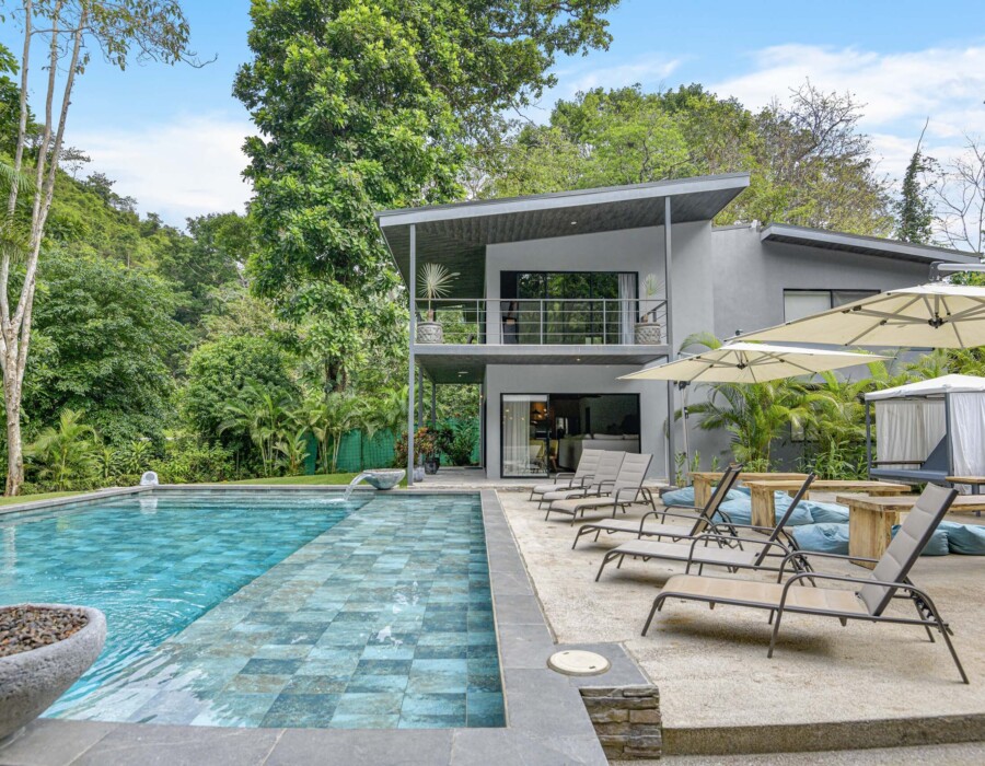 Pool with sun loungers at Seven Ranch