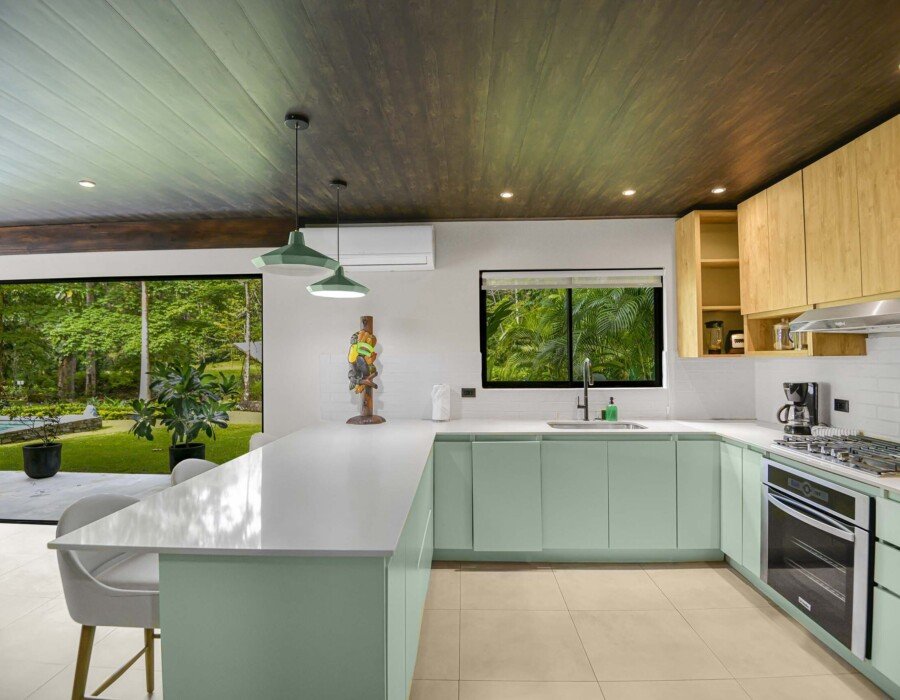 Spacious, windowed kitchen space with designer cabinetry in Seven Ranch