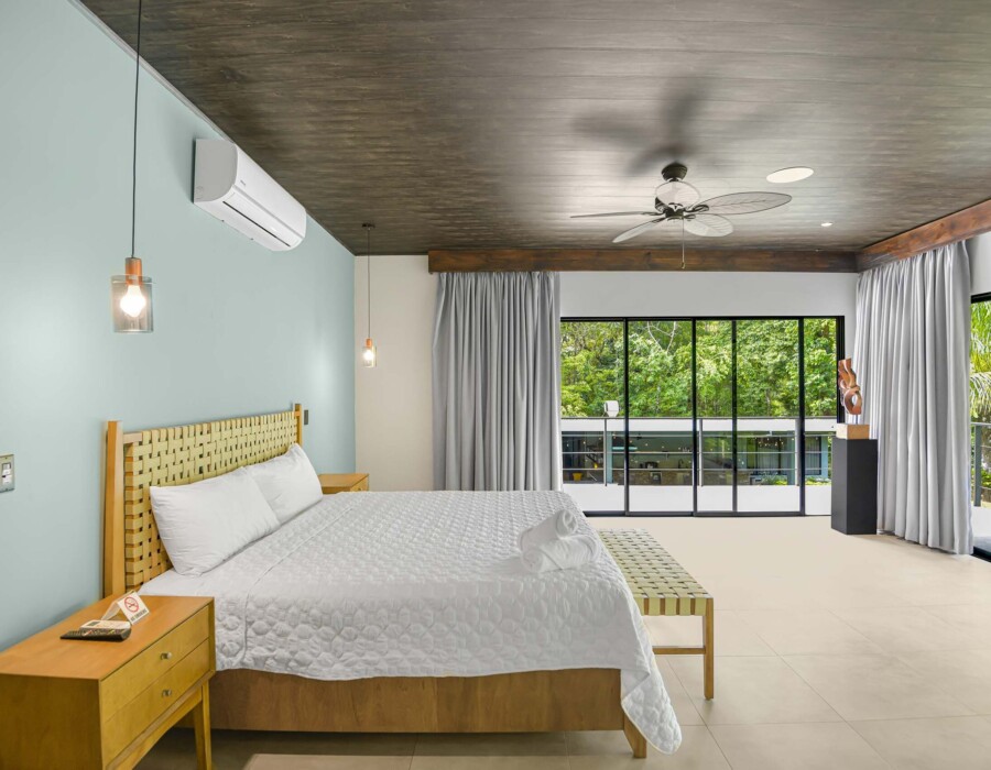 Designer furniture in master bedroom with king bed at Seven Ranch