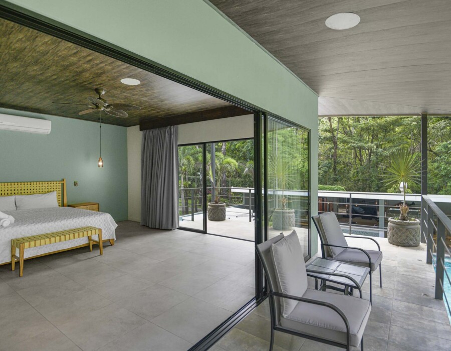 Master bedroom with king bed in Seven Ranch