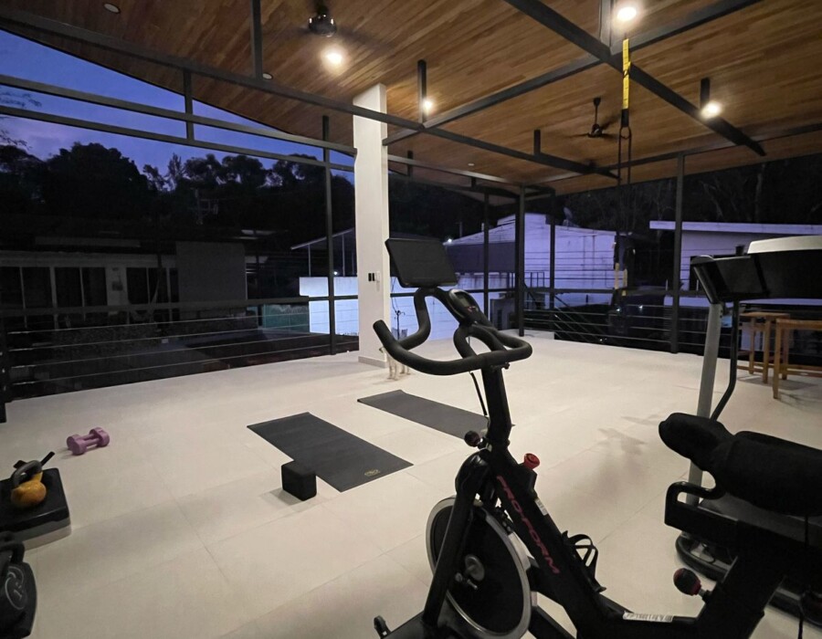 Terrace gym with stationary bikes, at Casa Brisa