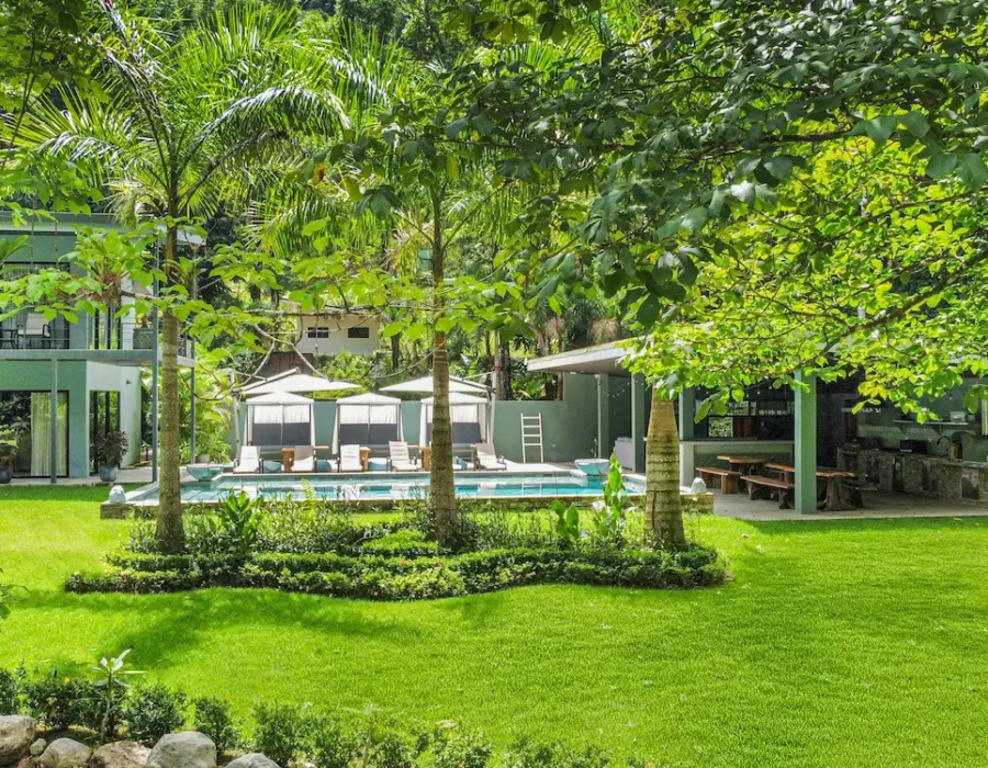 Wide view of the tropical garden at Seven Ranch