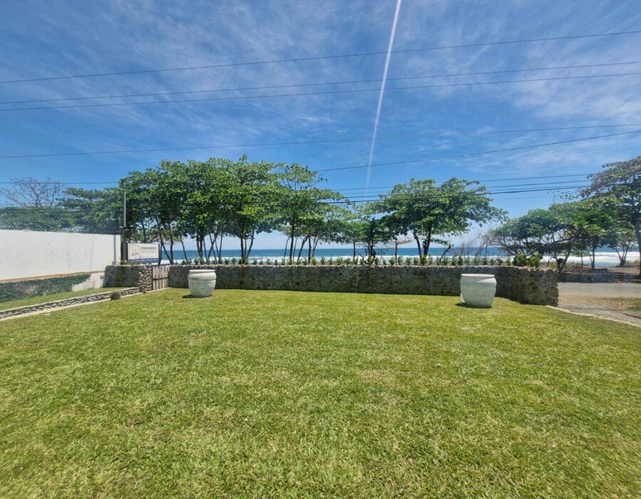 Beachfront patio with ocean views in Playa Hermosa luxury villa