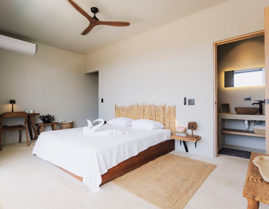 Luxury bedroom with ceiling fan and natural light in Playa Hermosa villa near Jaco Costa Rica