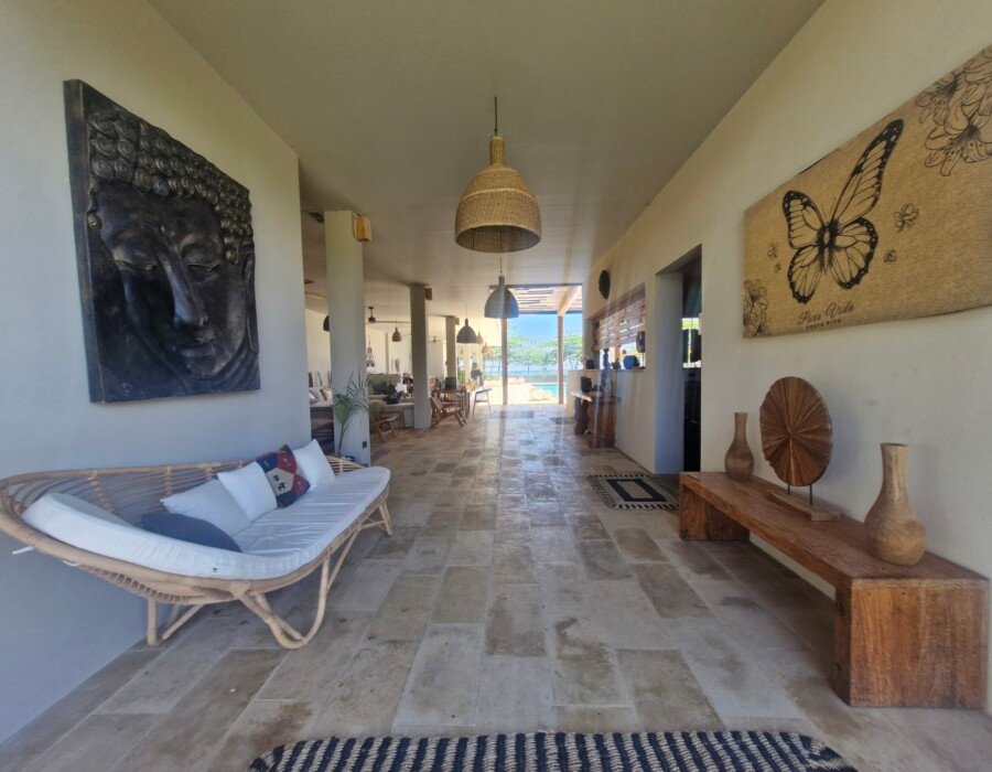 Hallway with sofa seating in Playa Hermosa luxury villa
