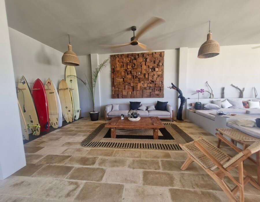 Living room with surfboards in beachfront villa near Jaco Costa Rica