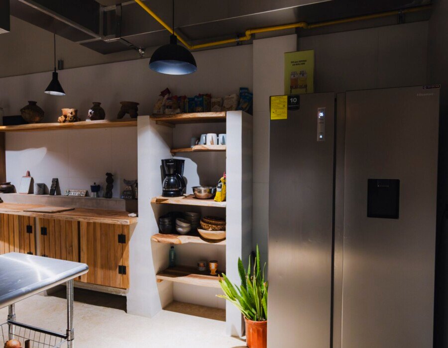 Modern open kitchen with pendant lighting in Playa Hermosa home