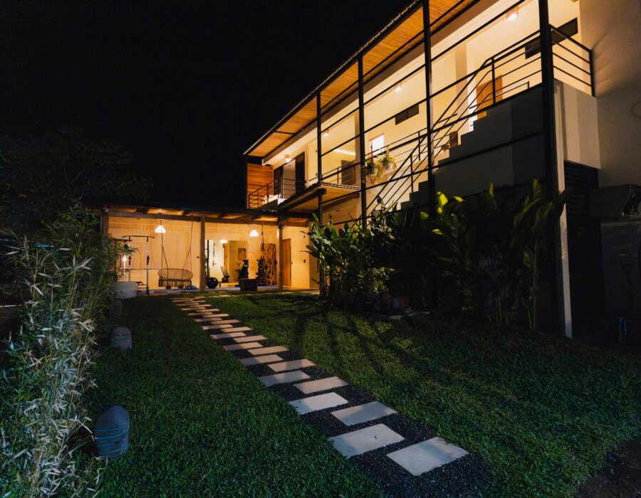 Rear patio with night lighting in Playa Hermosa luxury villa